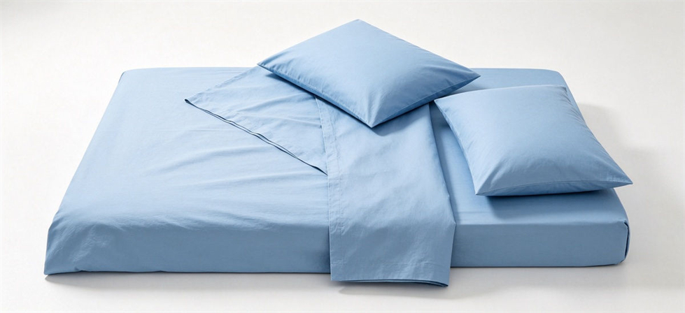 Light blue bedding flat lay hero for institutional procurement, inspection and supply planning