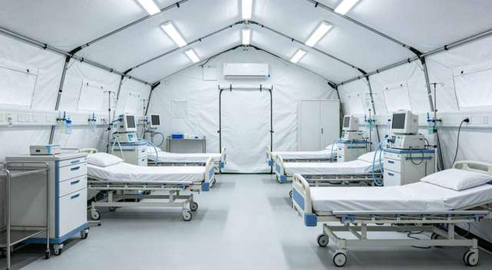 Medical emergency tent interior with medical equipment and beds, custom OEM field hospital shelters, professional product photography, blue sky background