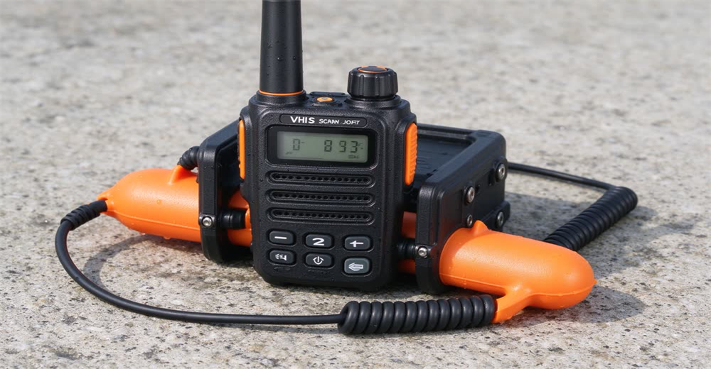 Front view of black VHF marine two-way radio showing maritime communication equipment for vessel emergency Front view of black VHF marine two-way radio showing maritime communication equipment for vessel emergency