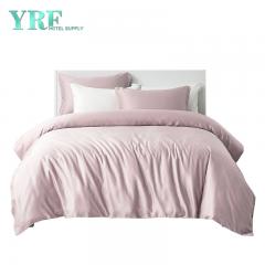 Ropa de cama de hotel rosa